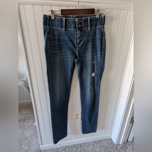 Mid rise skinny fit distressed jeans